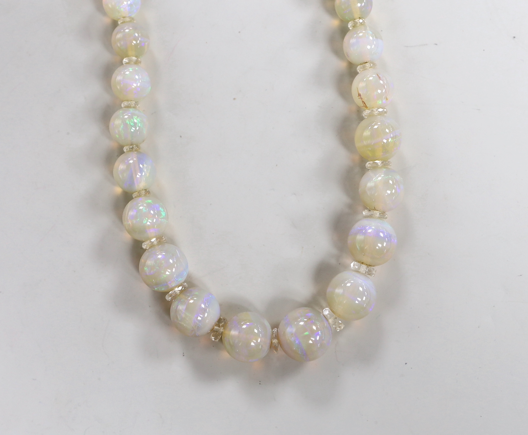 A single strand graduated translucent opal bead necklace, 38cm.